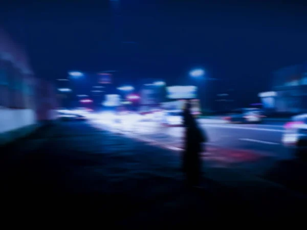 Abstract colorful bokeh night city background. City landscape blurred background concept.