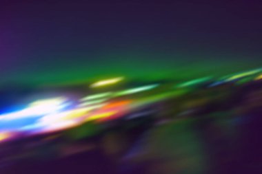 Soyut renkli Bokeh gece arkaplanı. Soyut ışık Bokeh gece arkaplanının odaklanmış görüntüsü