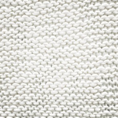  Sıcak, beyaz, el yapımı süveter arka planı. Beyaz örgü arka plan.