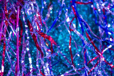Holiday Christmas tree garland decoration. New Years  tinsel texture. 