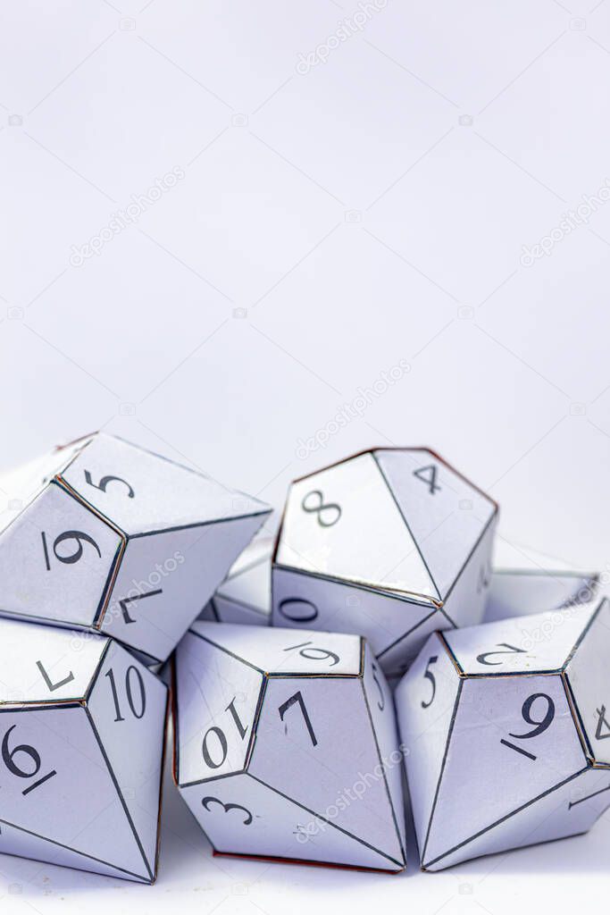 handmade Pentagonal trapezohedron dice in white paper with numbers