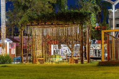 Cassilandia, Mato Grosso do Sul, Brazil - 12 18 2022: Sao Jose Square in the city of Cassilandia decorated for Christmas with lights at night