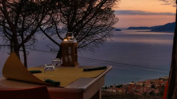 tables of a restaurant with a beautiful sea view in a western Ligurian restaurant in borgio verezzi, during the summer of 2022