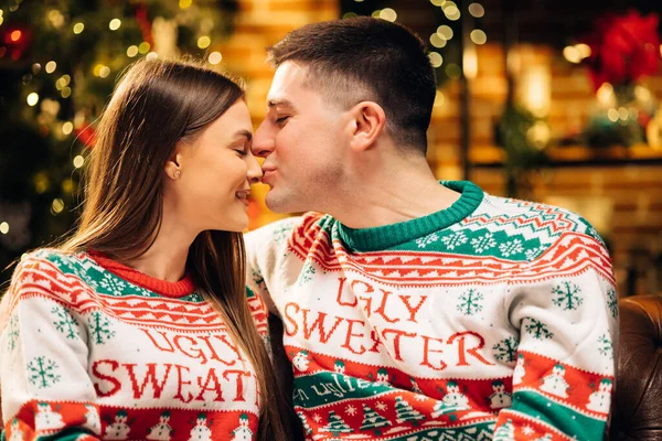 Family, christmas, holidays and people concept. Romantic couple in love feel happiness from their romance while spending Christmas together. Enjoying perfect relationship and spending winter holidays — Stockfoto