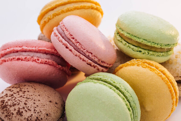 Close up of Multicolored Macarons Cookies. Multicolor macarons , French macaroon, greedy pastry. Food concept.
