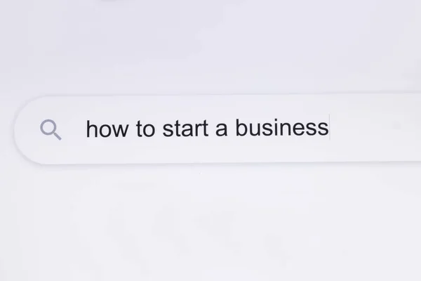 How to start a business - Internet browser search bar typing question. Search for information about how to start a business in the Internet browser. Typing in a search line on the computer — Stock Photo, Image