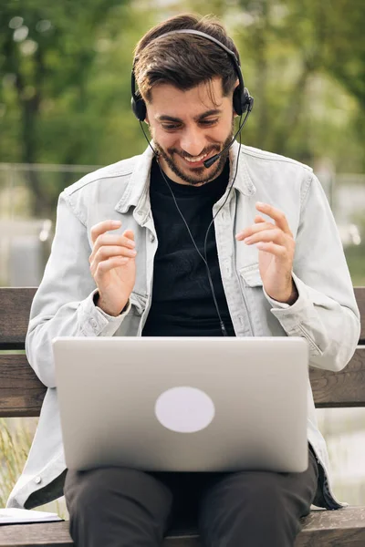 Man Wear Headphones Making Video Conference Business Call Laptop Speaking — Stock Photo, Image
