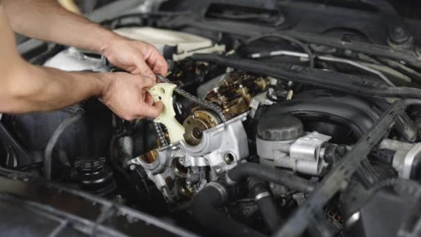 Unrecognizable Mechanic Repairing Automobile Motor Using Tool Car Mechanic Repair — Stockvideo