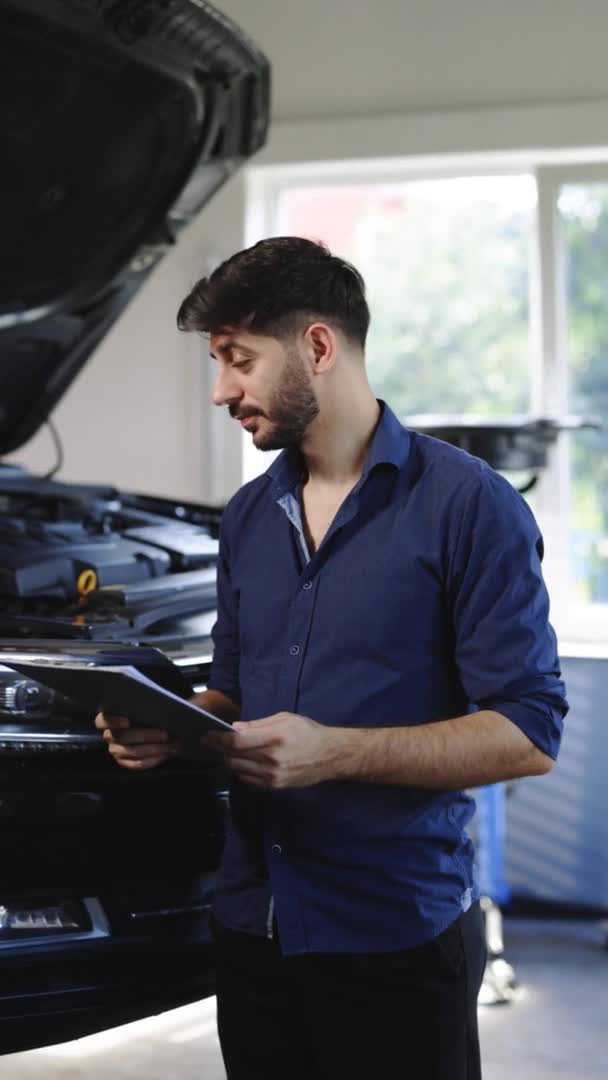 Vertical Video Portrait Professional Automotive Mechanic Technician Working Check Repair — Vídeos de Stock