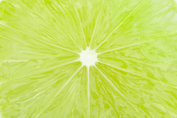 Green lime slice Makro Nahaufnahme Hintergrund Textur — Stockfoto