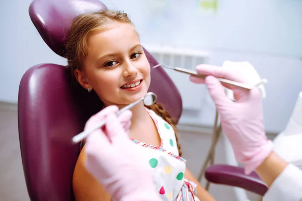 Lovely Little Girl Smiling While Talking Pediatric Dentist Doing Examination — Stock Photo, Image