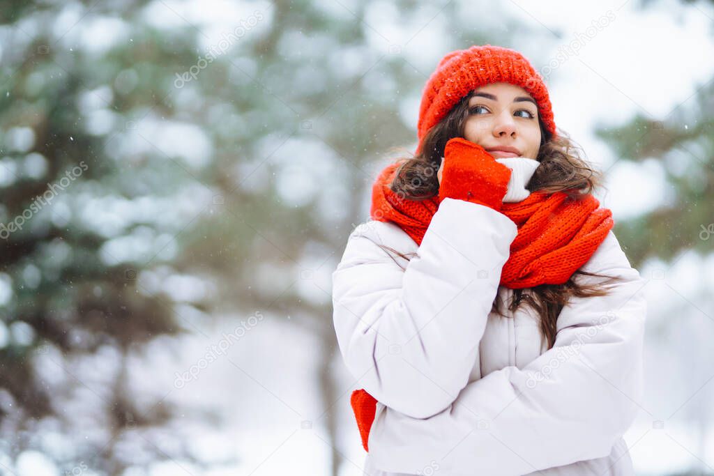 Fashion young woman in the winter time. Nature, holidays, rest, concept.