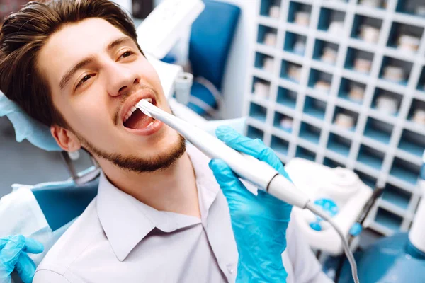 Young Man Dentist Chair Dental Procedure Overview Dental Caries Prevention —  Fotos de Stock