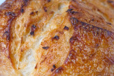 Beyaz ekmek arkaplan dokusunun soyut yakın plan görüntüsü. Ev yapımı ekmek yüzeyi. Güzel ekmek kabuğu, yakın plan..