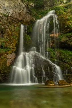 Beautiful color summer fresh water waterfall Virje in Slovenia Alps