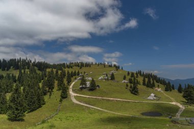 Beautiful blue sky summer day in Velika Planina mountains in color Slovenia