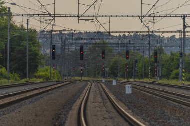 Railway yard in Prague Holesovice station in summer cloudy color evening