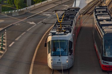 Tram car near station Prague Holesovice in summer sunny fresh color evening