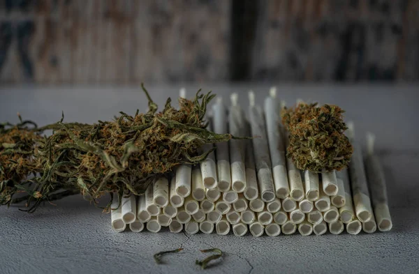 Marijuana Paper Joints Whte Concrete Floor Wooden Background — Stock Fotó