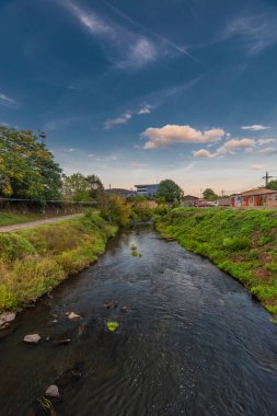 Industry part of Usti nad Labem town in summer hot sunset color evening with Bilina river