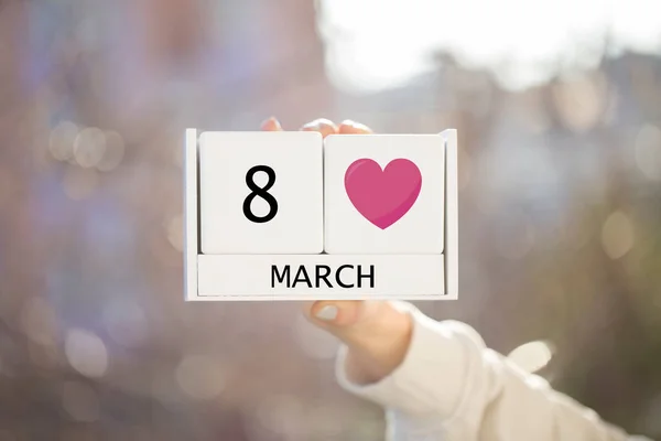 Woman Hand Holding March Wooden Calendar — Stock Photo, Image