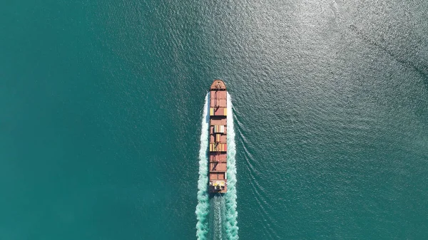 Aerial shot of container ship in ocean