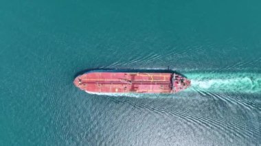 Aerial view of a heavy loaded container cargo vessel