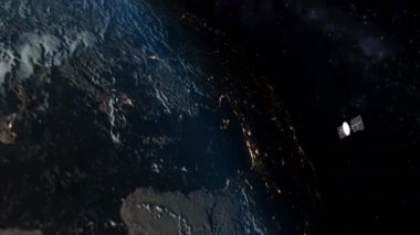 İletişim uydusu Dünya 'nın yörüngesinde uçuyor. Uzay teknolojisi