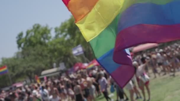 Lgbtq Rainbow Flag Waving Slow Motion People Background — Stock Video