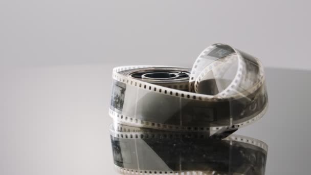 35Mm Film Negative Rotating Reflective Surface — Vídeo de stock