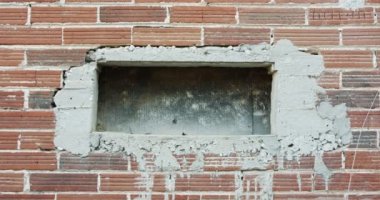 Abstract patterns ans textures - old cracked red bricks wall