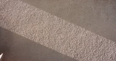 Abstract - ageing concrete wall wih textures of cracks and stains