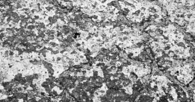 Abstract - close up of old paint texture on tarmac