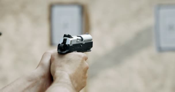 Slow Motion Hand Gun Firing Cartridge Flying Away — Wideo stockowe