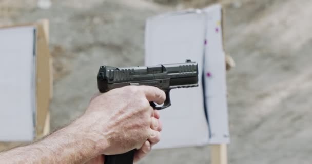 Slow Motion Hand Gun Firing Cartridge Flying Away — Stock Video