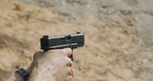 Hand Gun Firing Cartridge Flying Away — Αρχείο Βίντεο