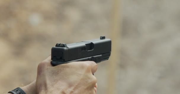 Hand Gun Firing Cartridge Flying Away — Stock Video