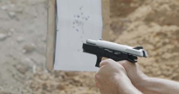 Hand Gun Firing Cartridge Flying Away — Αρχείο Βίντεο