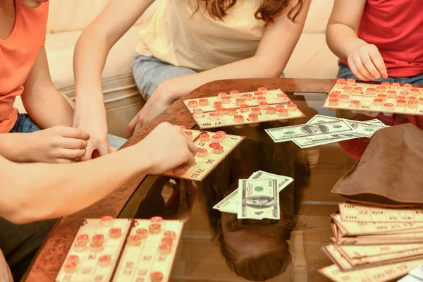 Children Play Loto Rearrange Chips Hands Stock Image