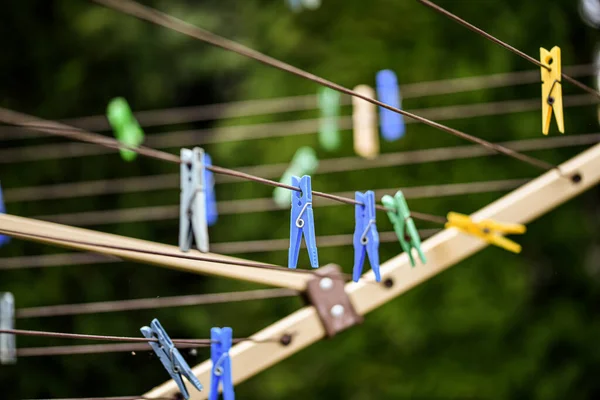 Clothespins for drying wet and washed clothes.