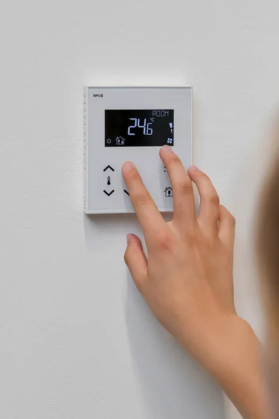 Woman Controls Temperature House Air Conditioning Heating System Private House — Stockfoto