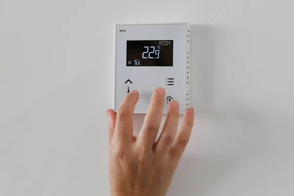 Woman Controls Temperature House Air Conditioning Heating System Private House — Stockfoto