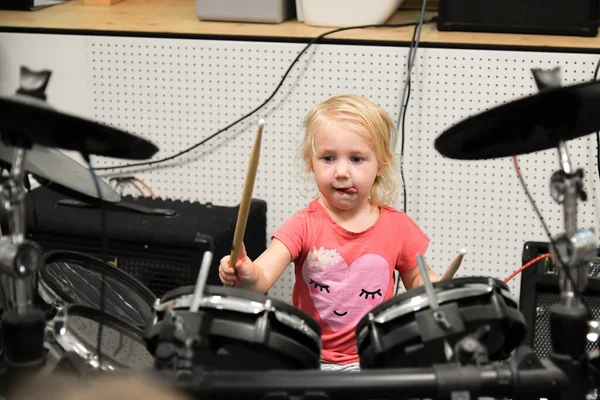 Little Girl Tries Play Drum Kit Music School — Stock Fotó