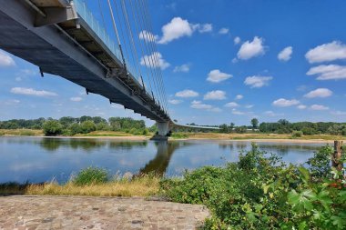 Modern suspension bridge over the river Elbe in Schoenebeck, Saxony-Anhalt, Germany.