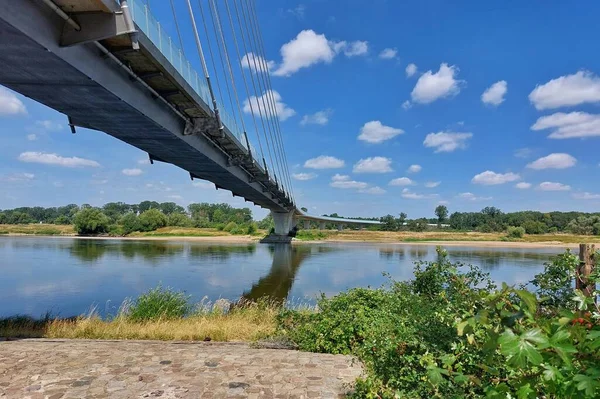 Modern suspension bridge over the river Elbe in Schoenebeck, Saxony-Anhalt, Germany.