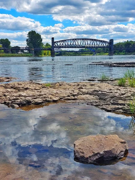 View from the Domfelsen (lit. cathedral rocks) in Magdeburg, Germany. This rock formation in the Elbe is only exposed in drought..