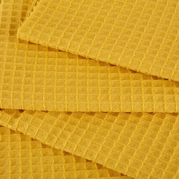 Pamuk tekstil, kumaş dokusunu kapatır. Pamuk kumaş dokusu. Kumaş Tekstil Yüzeyinin Üstten Görünümü. Giysi Arkaplanı. Metin Boşluğu. Tasarımcılar için soyut arkaplan ve doku.