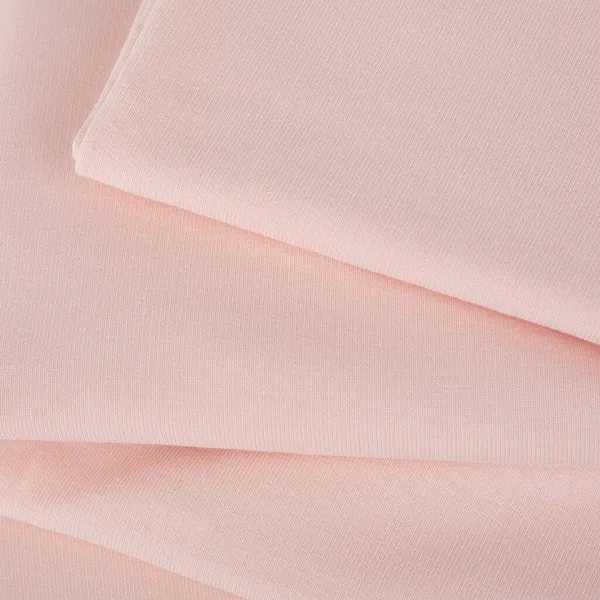 Pamuk tekstil, kumaş dokusunu kapatır. Pamuk kumaş dokusu. Kumaş Tekstil Yüzeyinin Üstten Görünümü. Giysi Arkaplanı. Metin Boşluğu. Tasarımcılar için soyut arkaplan ve doku.