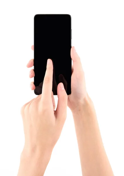 女性の手は白い背景に隔離された空白の画面と黒のスマートフォンを保持 — ストック写真