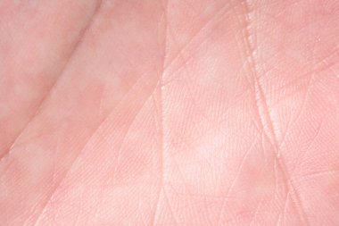 Pembe deri dokusunun arka planı. Sağlıklı cilt. Deri hücrelerinin makro fotoğrafı.